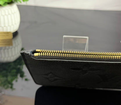 Authentic Louis Vuitton Monogram Empreinte Neverfull Pouch
