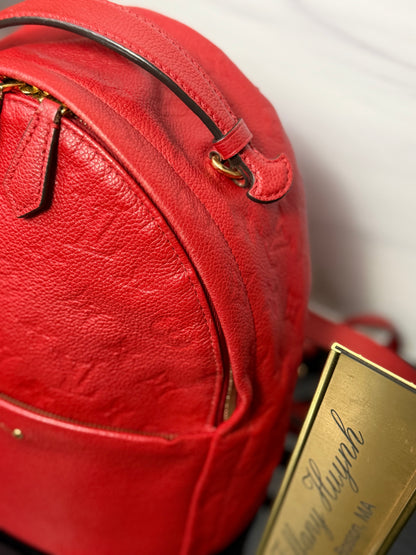 Authentic Louis Vuitton Cerise Monogram Empreinte Sorbonne Backpack