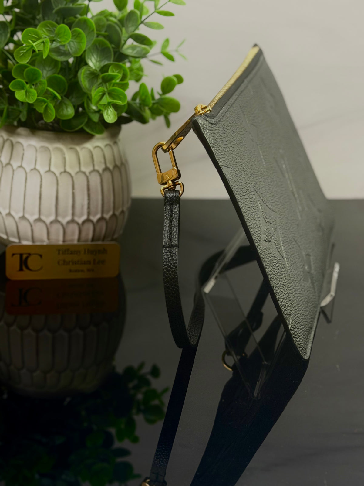 Authentic Louis Vuitton Monogram Empreinte Neverfull Pouch