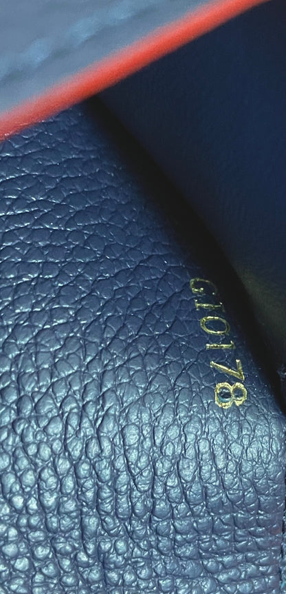 Authentic Louis Vuitton Empreinte Multicartes in Marine Rouge