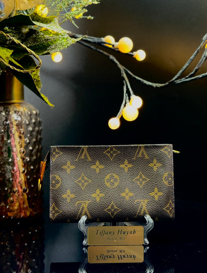 Authentic Louis Vuitton Monogram Bucket Pouch PM