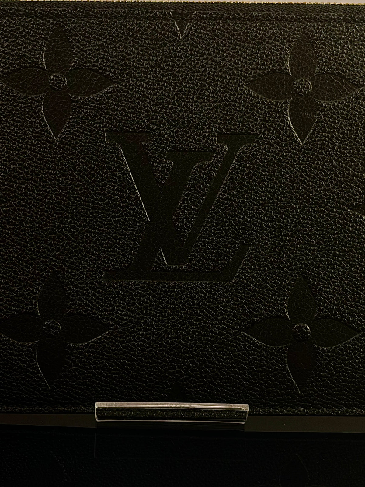 Authentic Louis Vuitton Monogram Empreinte Neverfull Pouch