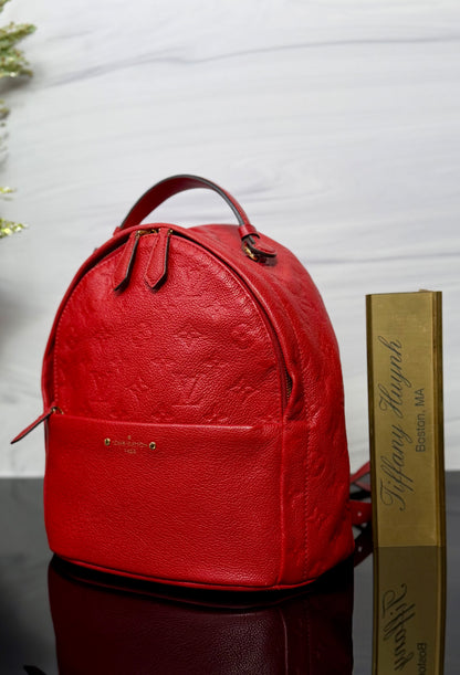 Authentic Louis Vuitton Cerise Monogram Empreinte Sorbonne Backpack