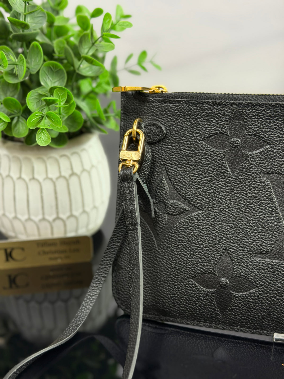 Authentic Louis Vuitton Monogram Empreinte Neverfull Pouch