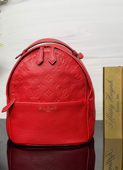 Authentic Louis Vuitton Cerise Monogram Empreinte Sorbonne Backpack