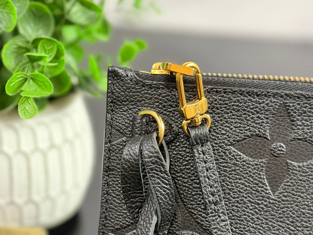 Authentic Louis Vuitton Monogram Empreinte Neverfull Pouch