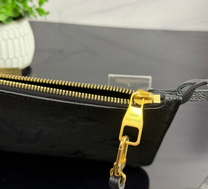 Authentic Louis Vuitton Monogram Empreinte Neverfull Pouch