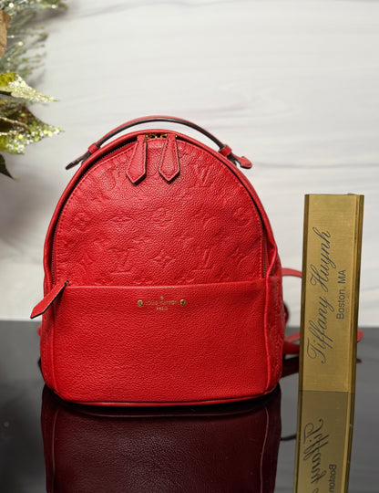 Authentic Louis Vuitton Cerise Monogram Empreinte Sorbonne Backpack
