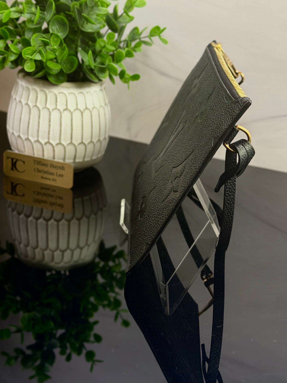 Authentic Louis Vuitton Monogram Empreinte Neverfull Pouch