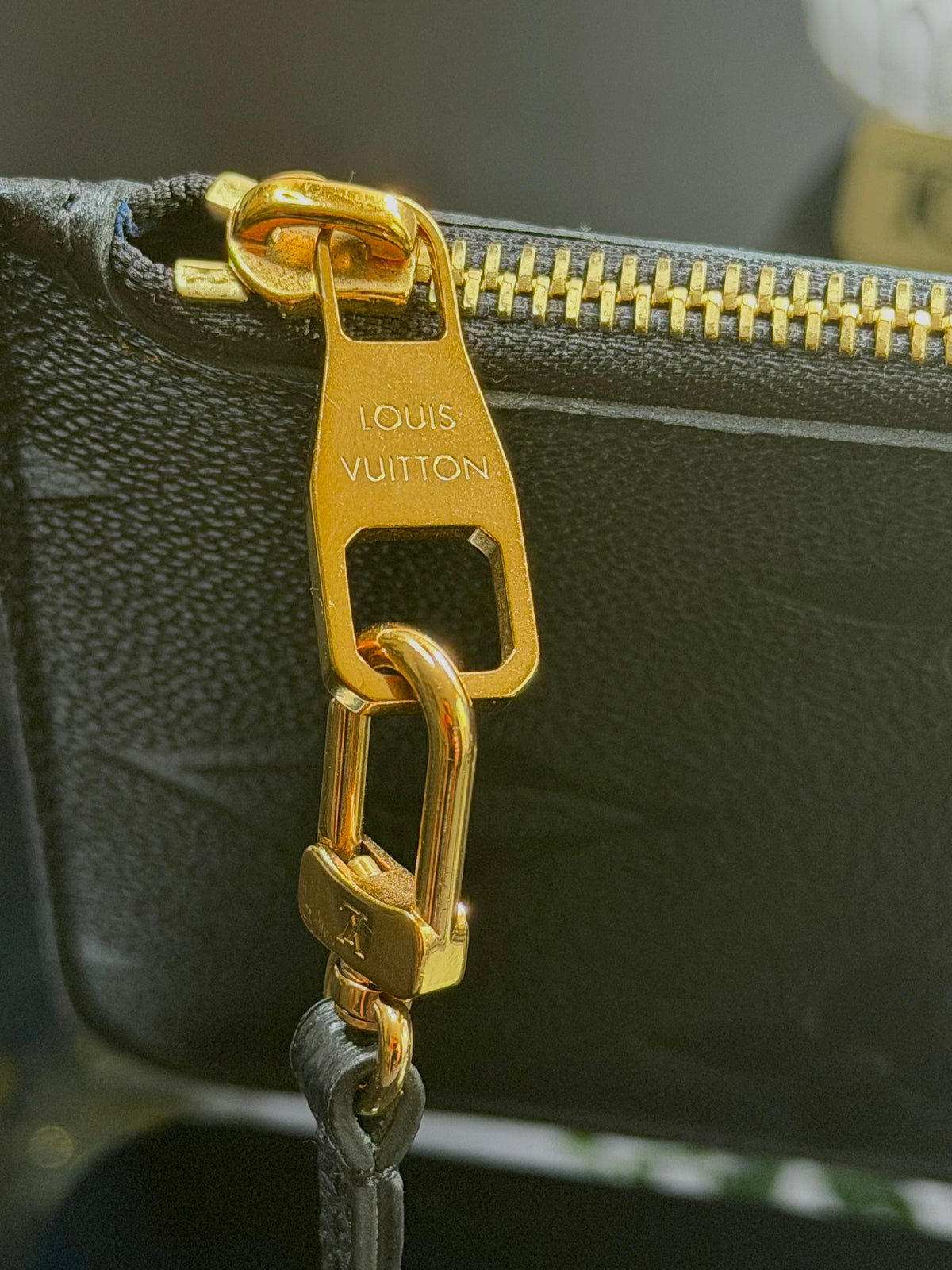 Authentic Louis Vuitton Monogram Empreinte Neverfull Pouch