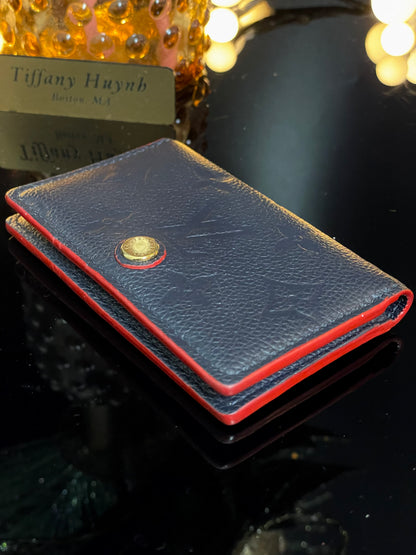 Authentic Louis Vuitton Empreinte Multicartes in Marine Rouge