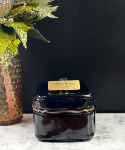 Authentic CHANEL Vanity Cosmetic Case crafted of Black Patent Leather