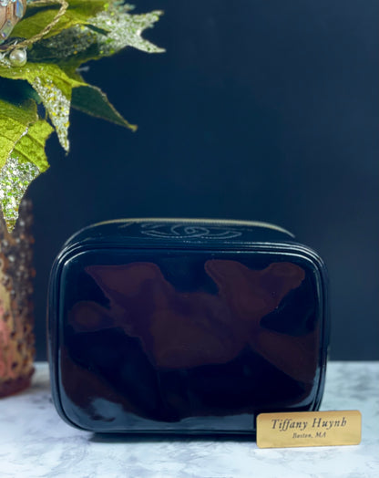 Authentic CHANEL Vanity Cosmetic Case crafted of Black Patent Leather