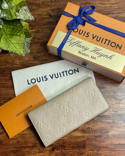 Authentic Louis Vuitton Empreinte Old Model Sarah Wallet Dune Beige
